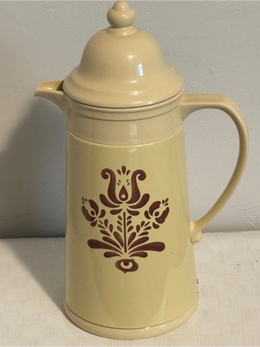 Vintage Pfaltzgraff tan with brown motif thermal carafe.